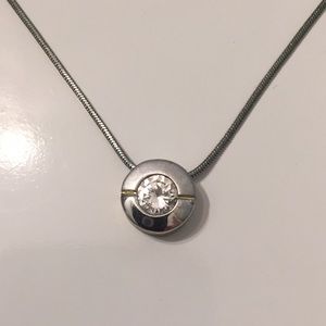 Silver tone crystal necklace.